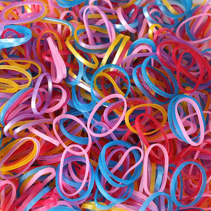 Multicolor elastic rubber bands neatly organized for office and home use.