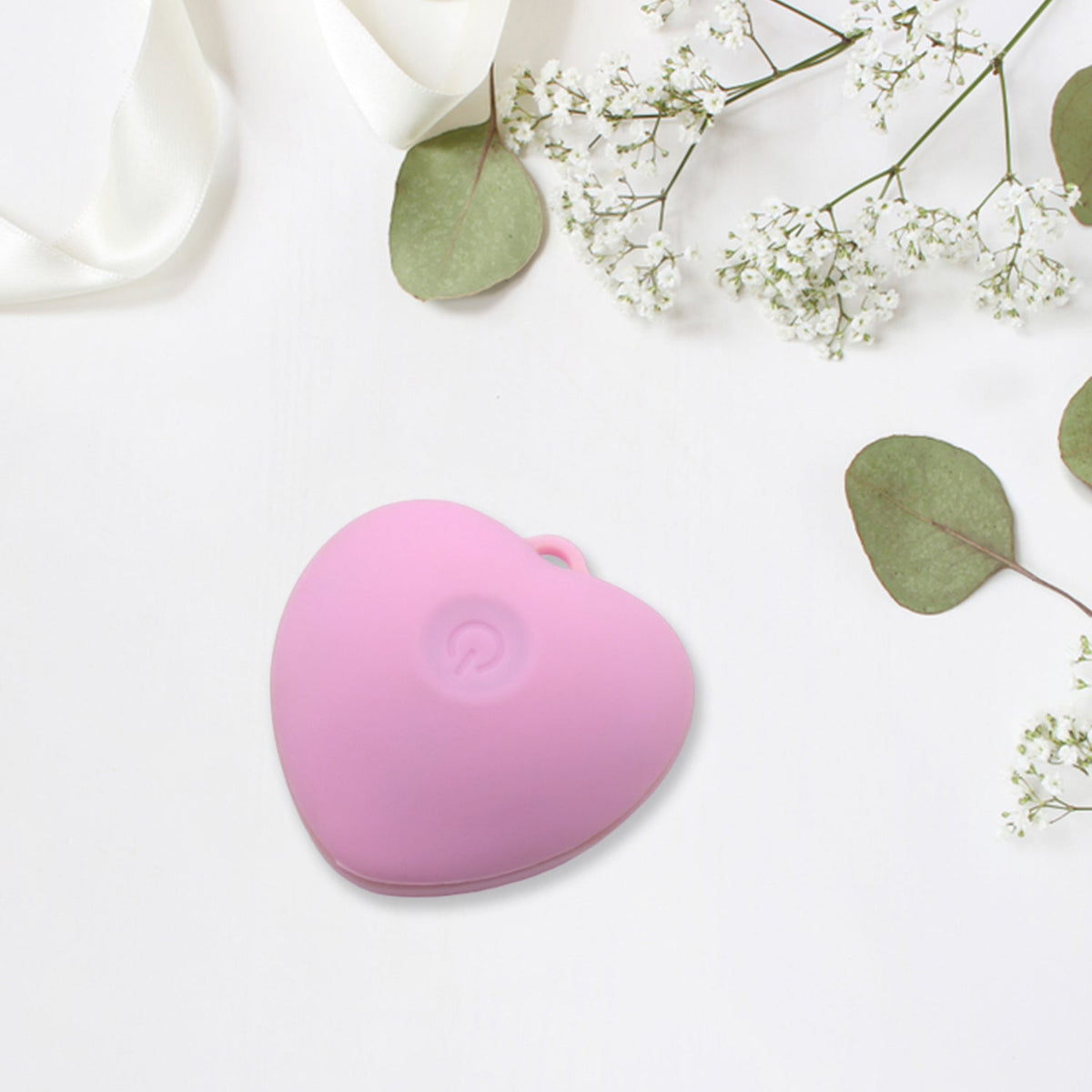 Silicone face brush in heart design for womenÕs daily skincare routine.