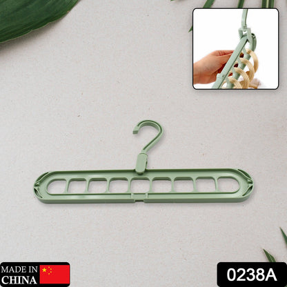 Close-up of the 360¡ rotatable head of the space-saving multi-hole clothes hanger.